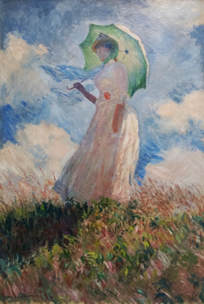 Woman with a Parasol Turned to the Left, by Claude Monet